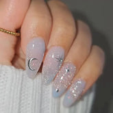 24Pcs Mid-length Almond Press on Fake Nails with Cat's Eye Blue Smudge Design False Nail Star Moon Pattern Reusable Manicure Tip