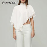 TWOTWINSTYLE Solid Loose Spliced Lace Up Elegant Blouses for Women High Neck Sleeveless Irregular Blouse Female Fashion Clothing