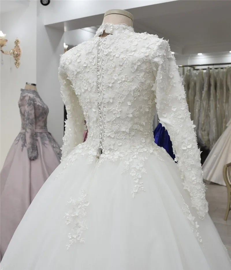 Vestido de noiva muzułmańskie sukienki ślubne Dubai High Szyja koronki 3d kwiaty perły długie rękawy sukienki ślubne szatę de mariage