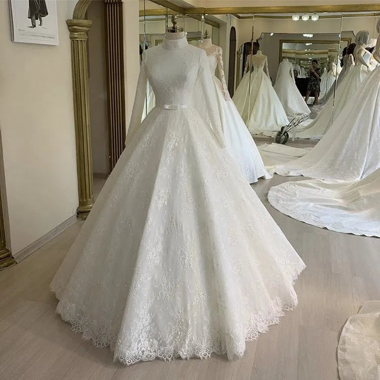 Eleganckie wysokie szyi długie rękawy koronkowe muzułmańskie sukienki ślubne A-line zapinany na błąd Tiul Pearl Beaded with Bow Vestido de noiva