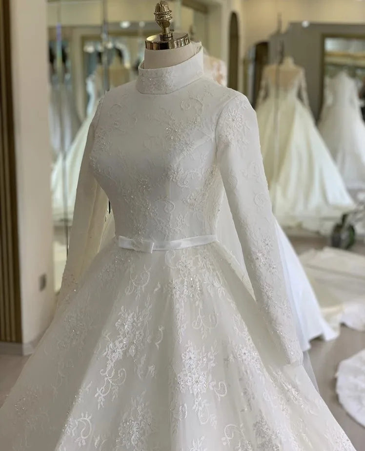 Eleganckie wysokie szyi długie rękawy koronkowe muzułmańskie sukienki ślubne A-line zapinany na błąd Tiul Pearl Beaded with Bow Vestido de noiva