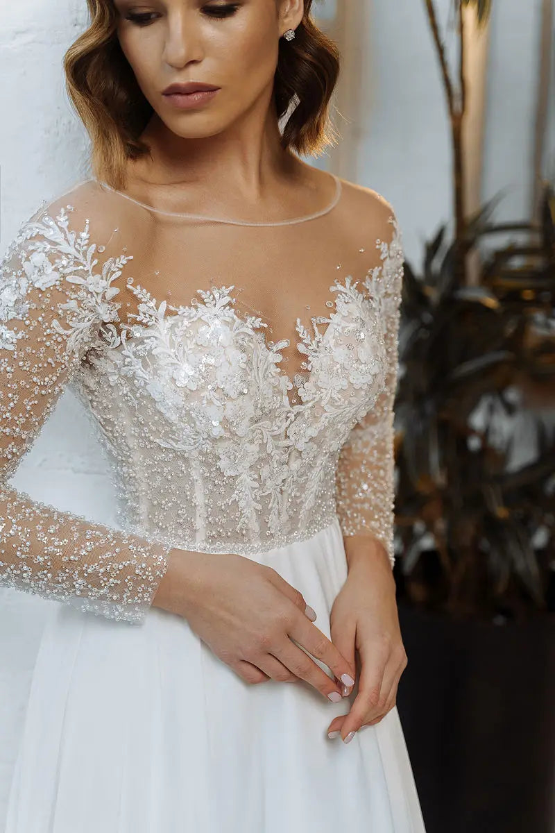 Abito da sposa a maniche lunghe APPLICA ALLA A-LINE APPLICI DELLA BRIDALE ELEGENTI PER LA DONNE PERSONO PUBILIZZA