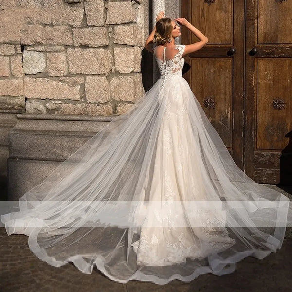 Exquisite O-Neck Wedding Dress Cap Sleeve Sheath Tulle Boho Button Bridal Gown Lace Appliques Illusion Train Vestido De Noiva